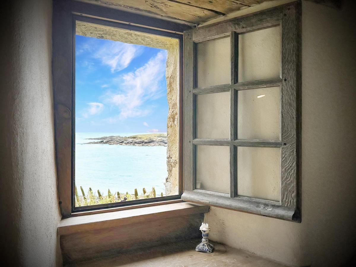 PORSPODER : MAGNIFIQUE VUE MER POUR CE COSY PENTY AVEC JARDIN ROCHERS TYPIQUES ET TERRASSE PANORAMIQUE